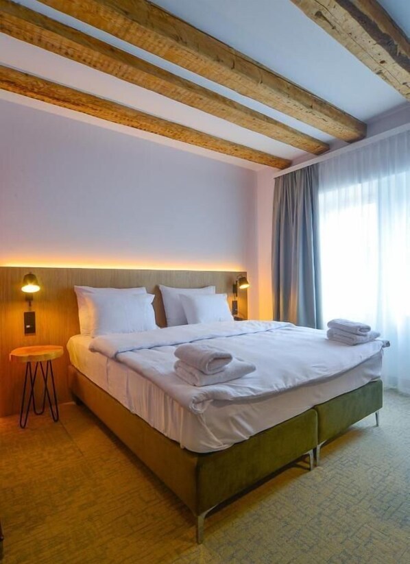 Habitación estándar con 1 cama matrimonial o 2 individuales, balcón