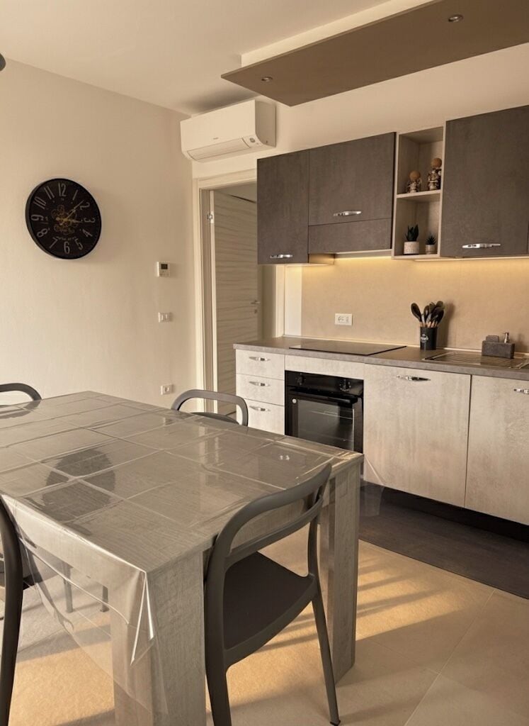 Appartamento Deluxe | Cucina privata | Frigorifero con congelatore, forno, piano cottura, lavastoviglie