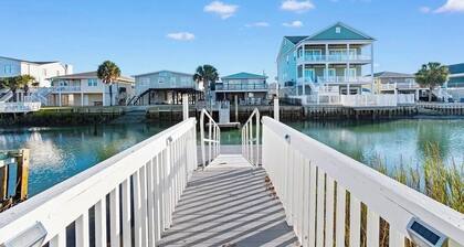 Fabulous 4-bedroom channel home with private dock in Cherry Grove Beach.