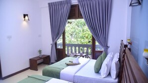A hotel room with two beds, a small table, a bench, and a balcony with a view. - Belvita Resort Ella (Ella)