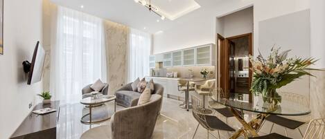 Elite Apartment | Living area | 55-inch Smart TV with digital channels