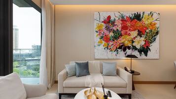 Appartement Deluxe, 2 chambres, balcon, vue ville | Coin séjour