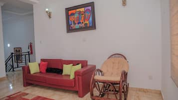 Deluxe appartement, balkon, uitzicht op tuin | Woonruimte