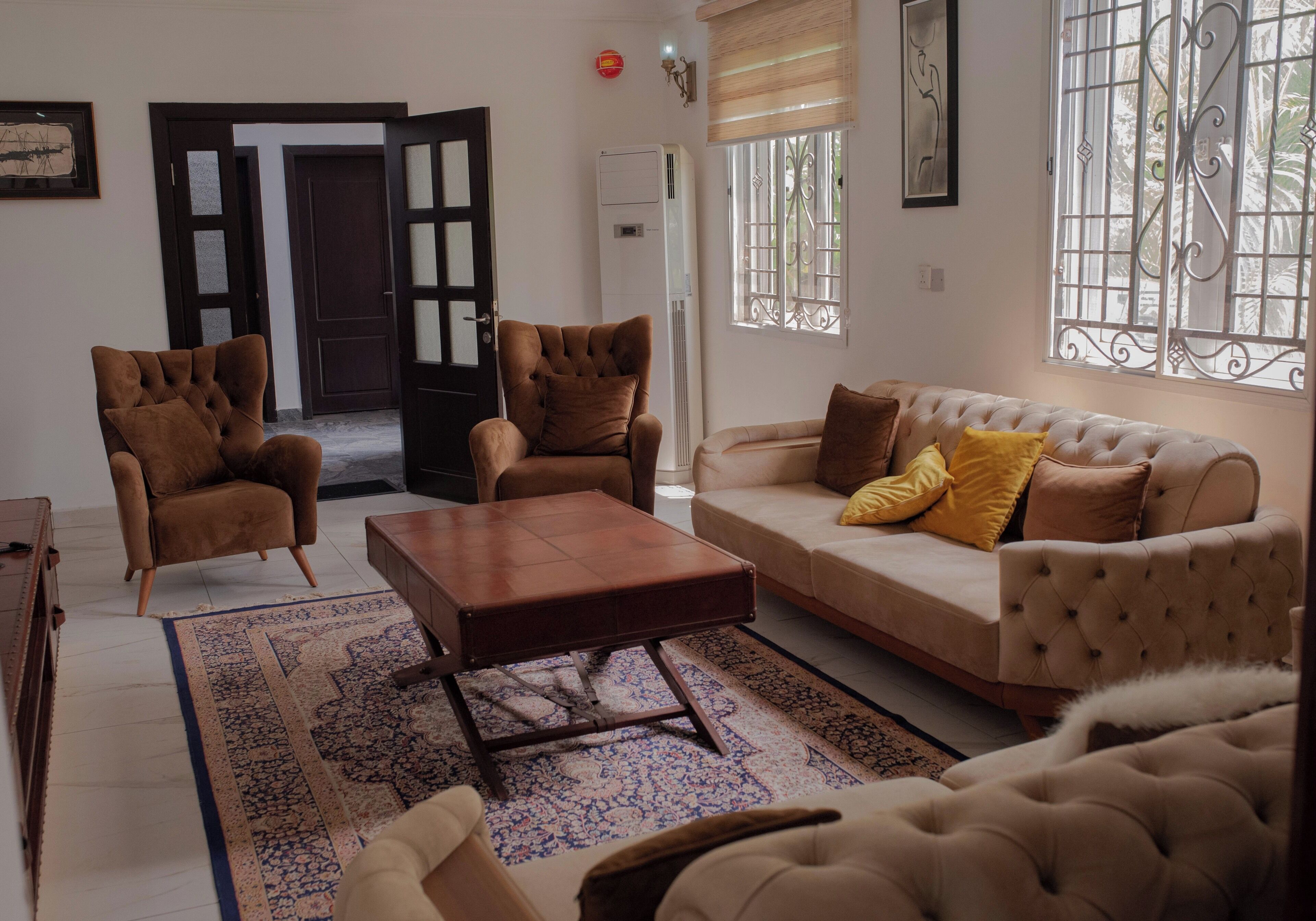 Deluxe-Apartment, Balkon, Gartenblick | Wohnbereich