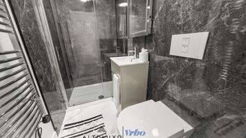 Shower, towels, soap, shampoo