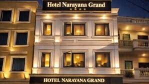 Hotel Narayana Grand with a prominent entrance, multiple windows, and a well-lit facade. - Narayana Grand Hotel (New Delhi)