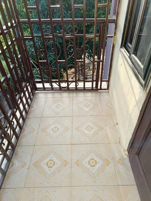 Room, Smoking, Balcony | Balcony - Room-single Room With a Double bed (Amasaman)