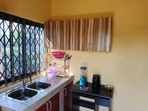 Room, Multiple Bedrooms, Smoking, Balcony | Private kitchen - Room-single Room With a Double bed (Amasaman)