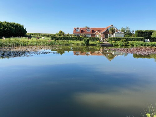 Private 5 Acre Lakeside Family/Large Group Cottage. Quiet Rural Farmside Stay!