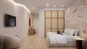 Une chambre à coucher moderne avec un lit, une table de chevet et un téléviseur fixé au mur.