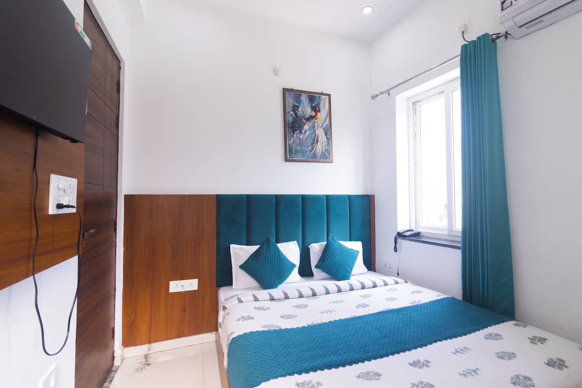 Chambre Confort double, 1 grand lit