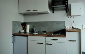 Frigorífic, forn, cafetera i tetera i bullidora elèctrica 