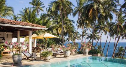 Saffron House: Private Seafront Villa with Infinity Pool & Tropical Gardens