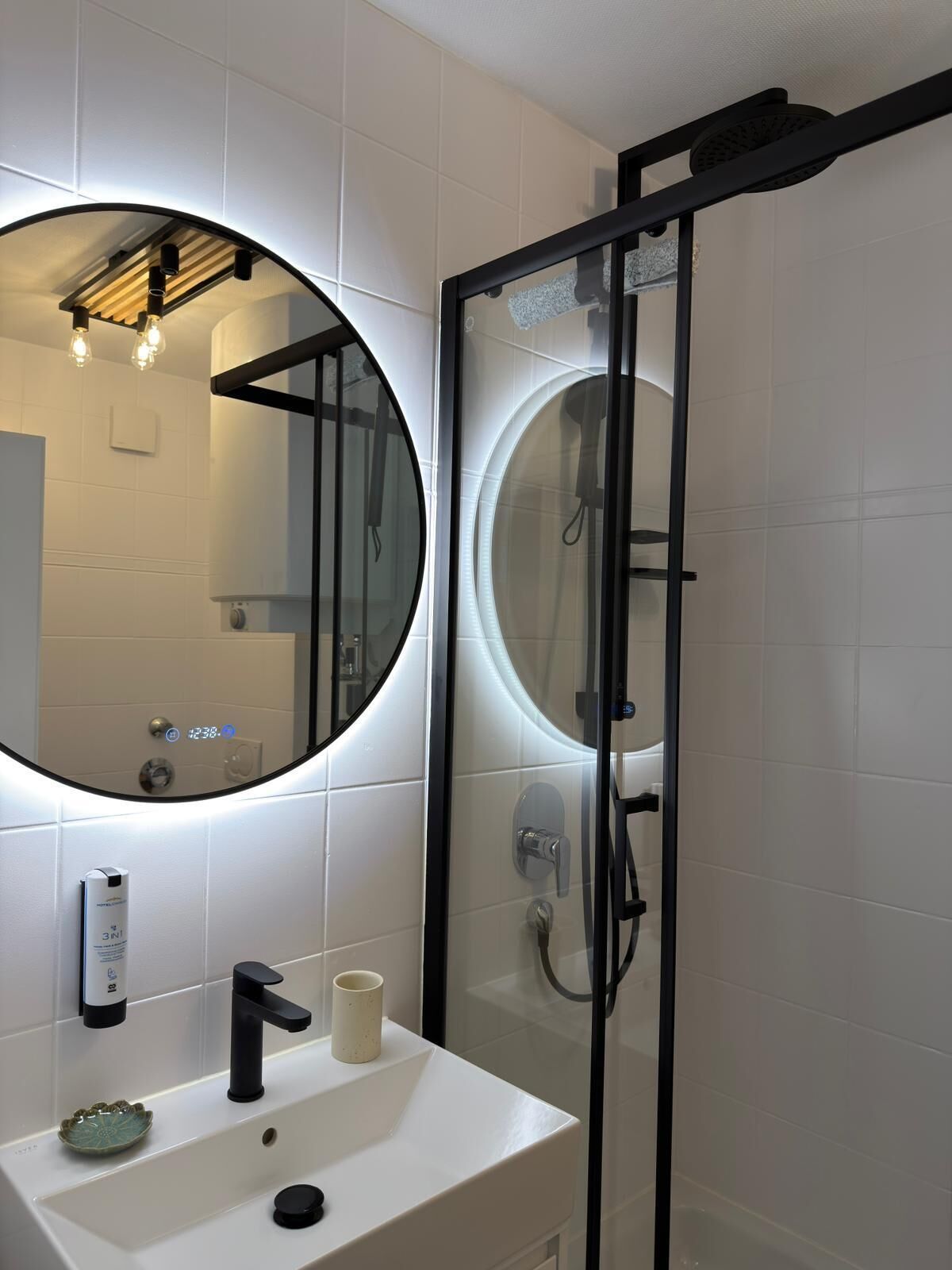 Shower, hair dryer, towels, shampoo