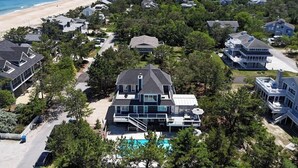 A residential area with houses, a beach, and a pool. - 29532 N. Cotton Way - Cotton Patch East (Bethany Beach)