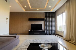 Deluxe Apartment, Private Bathroom, Garden View | Living area - ALSAWAH Luxury 2BR Apt AlKarma Residence (Sheikh Zayed City)