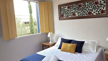 Quarto triplo superior, vista para o jardim