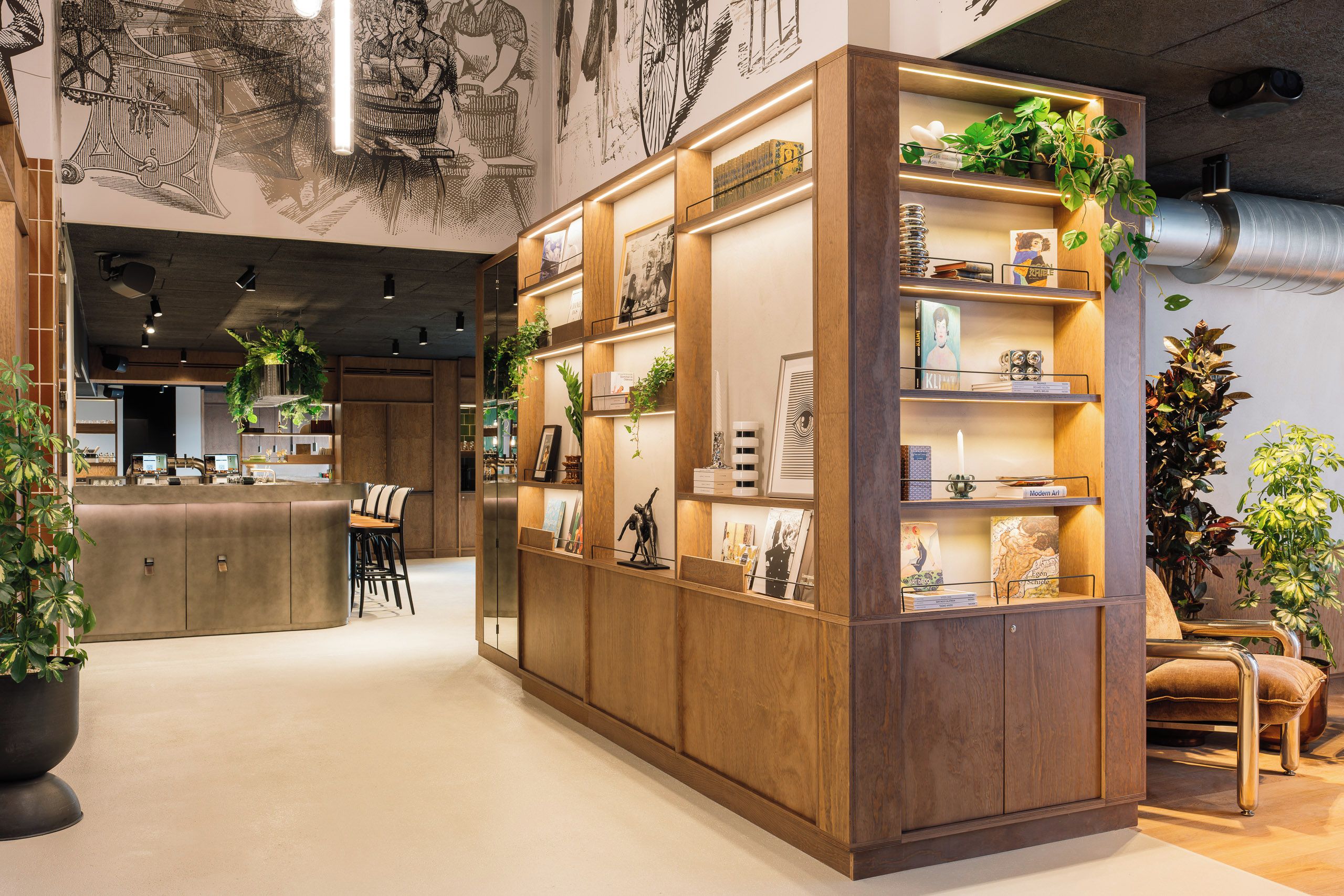 Un intérieur moderne avec une bibliothèque en bois, un coin bar et des sièges.
