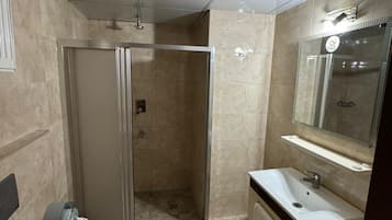 Hair dryer, towels, soap, shampoo