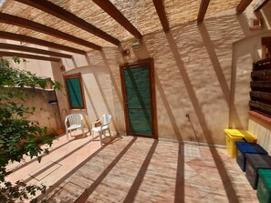 Terrace/patio - Villetta Glicine with Private Terrace, Garden and Air Conditioning in San Vito Lo Capo (San Vito Lo Capo)
