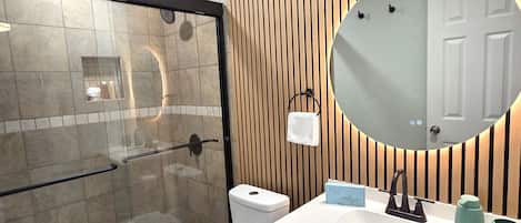 Hair dryer, towels, soap, toilet paper