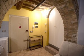 Interior - Cozy suite in the heart of Perugia, perfect for 2 guests.Elegant room, comfortable living room and kitchen equipped to feel right at home.The unique detail? The natural stone walls, which give charm and character to the environment.Bright and well-kept,  (Perugia)