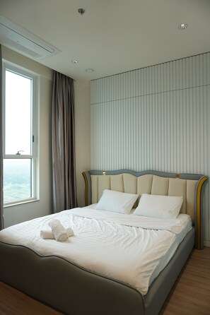 Deluxe Apartment, 1 Bedroom, Pool Access, City View | Individually furnished, iron/ironing board, free WiFi, bed sheets - Nice Apartments at Thu Thiem Ziet River (An Khanh, Thu Duc)