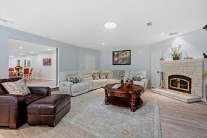 TV, fireplace, books