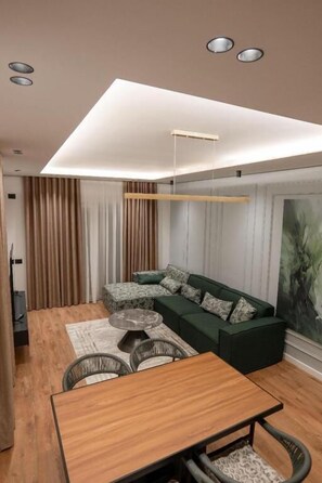 Duplex Apartment | Living area | 45-cm flat-screen TV with cable channels - Duplex Penthouse with Jacuzzi (Sarande)