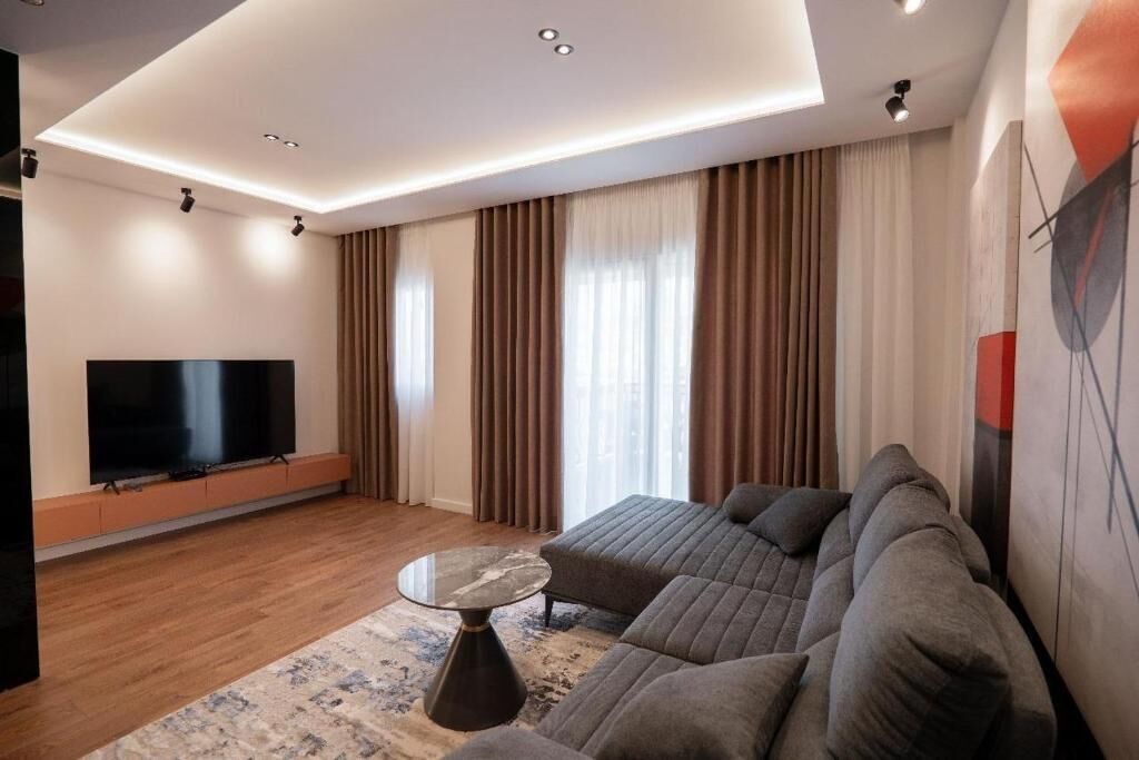 Duplex Apartment | Área de estar | TV de tela plana 45 cm com canais a cabo