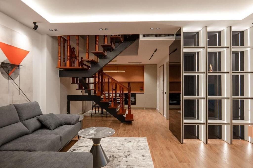 Duplex Apartment | Living area | 45-cm flat-screen TV with cable channels