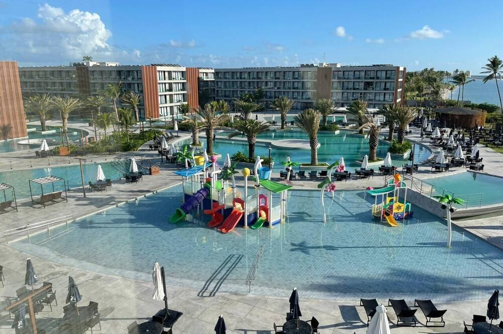 Flat com piscinas na Praia Muro Alto