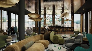 A modern bar area with seating and a bartender. - Motel One Koblenz (Koblenz)