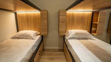 Dormitorio condiviso City | Biancheria da letto di alta qualità, insonorizzazione, Wi-Fi gratuito