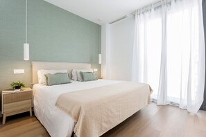 Apartamento (1 Bedroom) | 2 quartos, ferros/tábuas de passar roupa, Wi-Fi de cortesia
