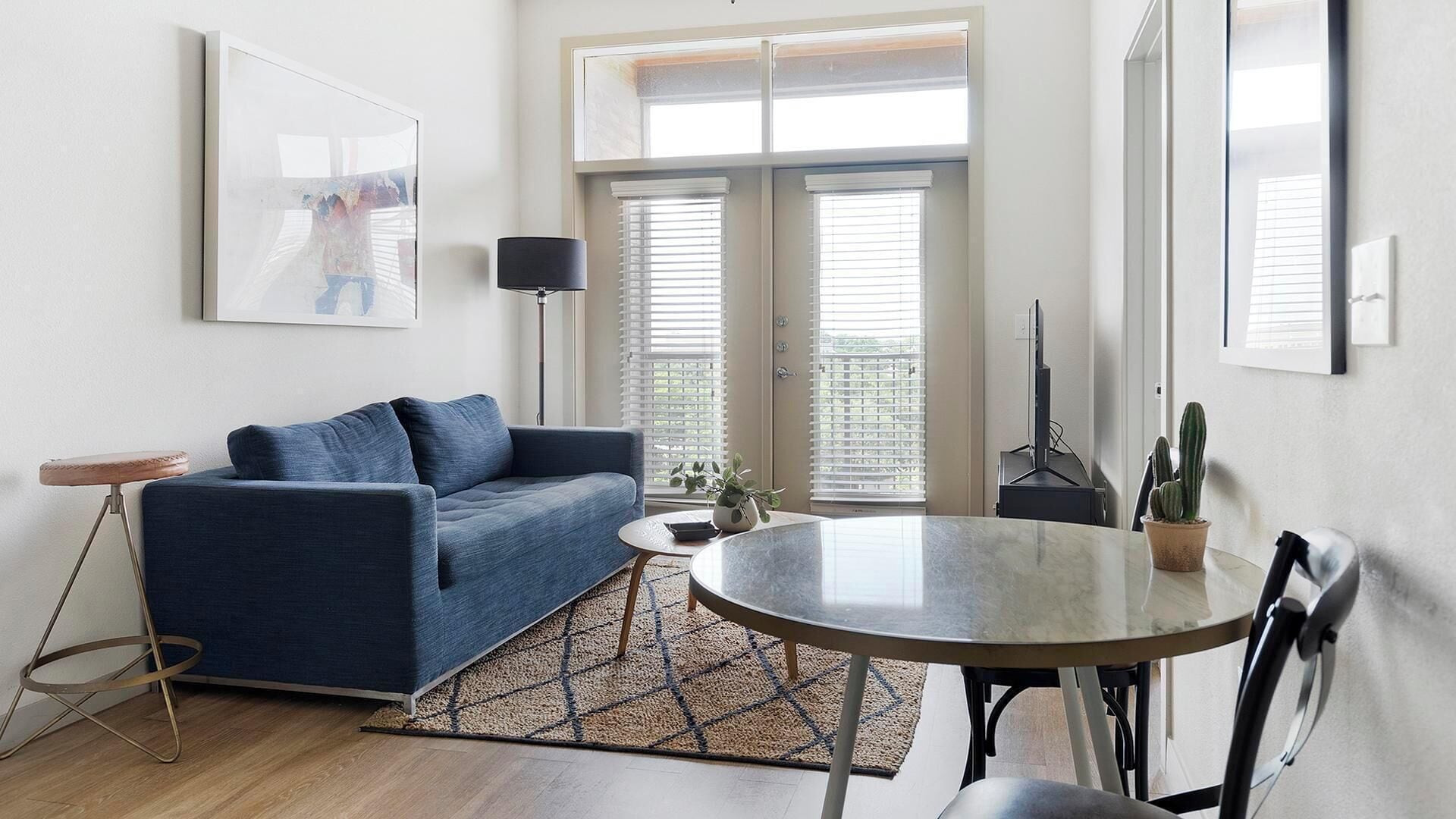Standard Apartment (2 Bedrooms) | Living area | 50-inch Smart TV with digital channels