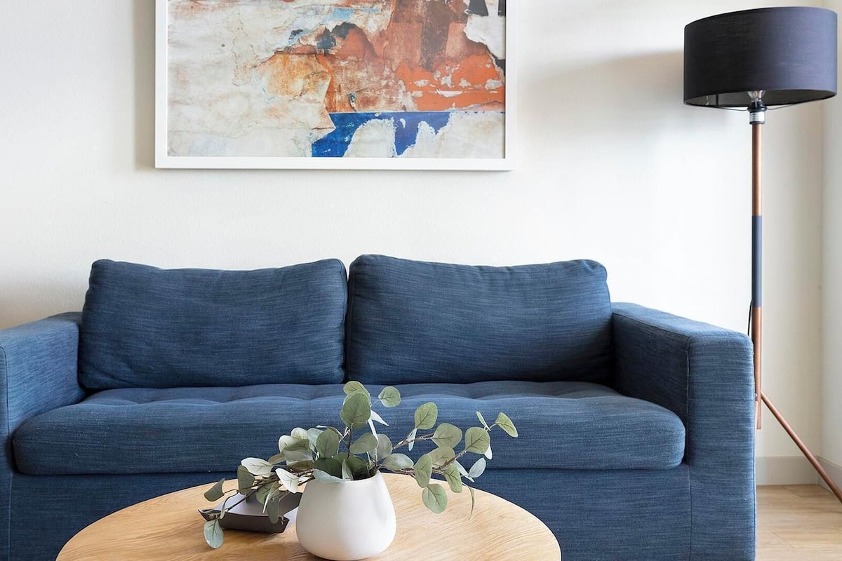 Standard Apartment (2 Bedrooms) | Living area | 50-inch Smart TV with digital channels