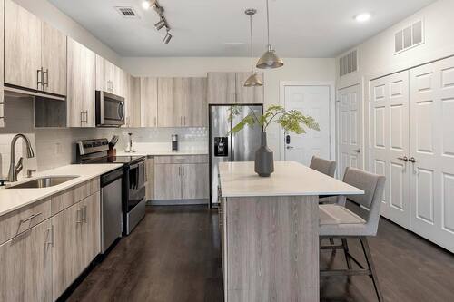 Appartement (2 Bedrooms) | Cuisine privée | Réfrigérateur, cafetière/bouilloire