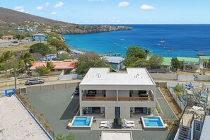 Exterior - Villa Anosia Laman: View with sunset, private pool, and 2 beaches nearby (Westpunt)