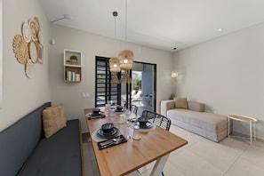 Dining - Villa Anosia Laman: View with sunset, private pool, and 2 beaches nearby (Westpunt)