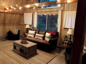 TV, fireplace - Secluded A-frame Loft Cabin on Lincoln Hills Trails Firepit ATV Friendly! (Irons)