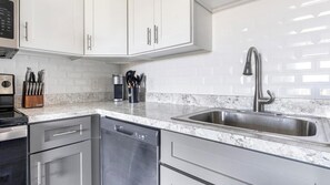 Studio (0 Bedroom) | Private kitchen | Fridge, microwave, oven, stovetop - Landing Apartments Near HCA Florida Fawcett Hospital (Port Charlotte)