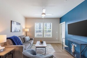 Apartment (1 Bedroom) | Living area | 50-inch TV with digital channels - Landing Furnished Apartments Near Point Washington State Forest (Santa Rosa Beach)