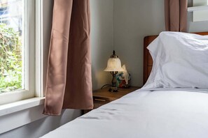 2 dormitorios, tabla de planchar con plancha, cuna de viaje y wifi