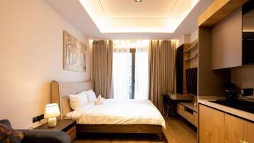 Deluxe Studio, Balcony, City View | In-room safe, soundproofing, iron/ironing board, free WiFi