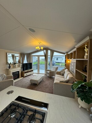 Living area - The Vogue Lodge - Golden Anchor Holiday Park (LM1) (Chapel Saint Leonards)