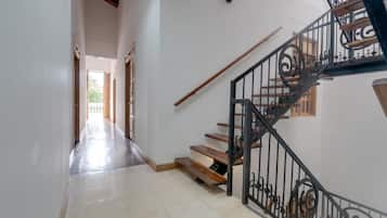 Habitación triple Deluxe | Interior