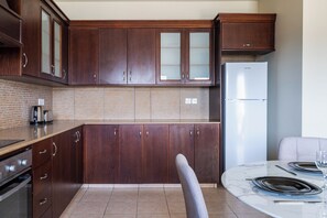 Apartment, Balcony, City View | Private kitchen | Fridge, microwave, oven, stovetop - Stylish 2BR Apt Balcony WiFi (Larnaca)