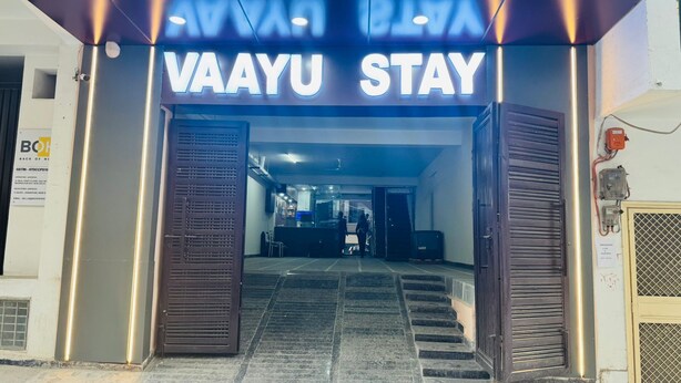 A hotel entrance with a sign reading 'VAAYU STAY' and a staircase leading inside. - Vaayu Homestay (New Delhi)