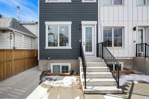 Exterior detail - Rooftop Patio | King Bed | 2 Ensuites + Garage (Calgary)